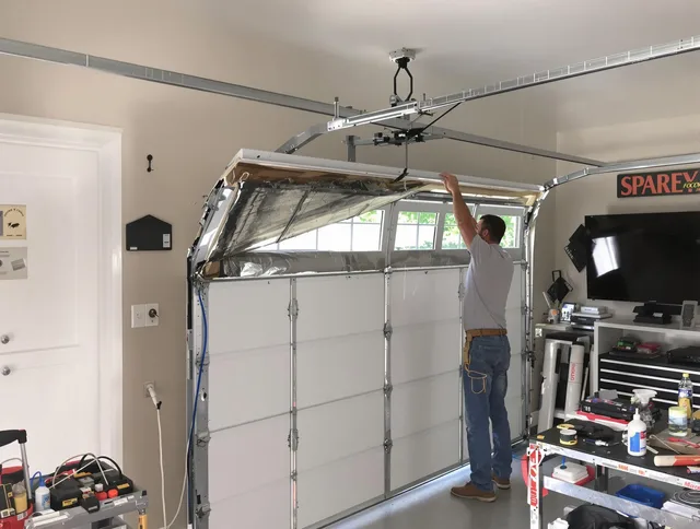 Garage door section replacement by Ellington Garage Door Repair in Ellington