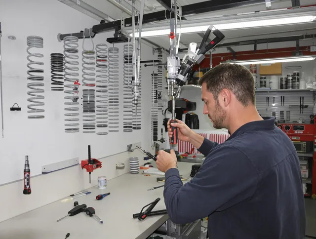 Ellington Garage Door Repair safety certified technician performing precision spring replacement in Ellington