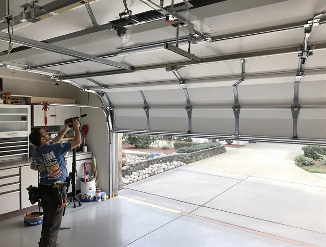Garage door track repair service by Ellington Garage Door Repair in Ellington